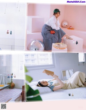 A woman sitting on a bed eating a donut.