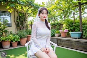 a woman sitting on top of a green chair